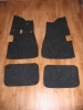 38b-Vyjímatelné koberečky-obšité černou koženkou